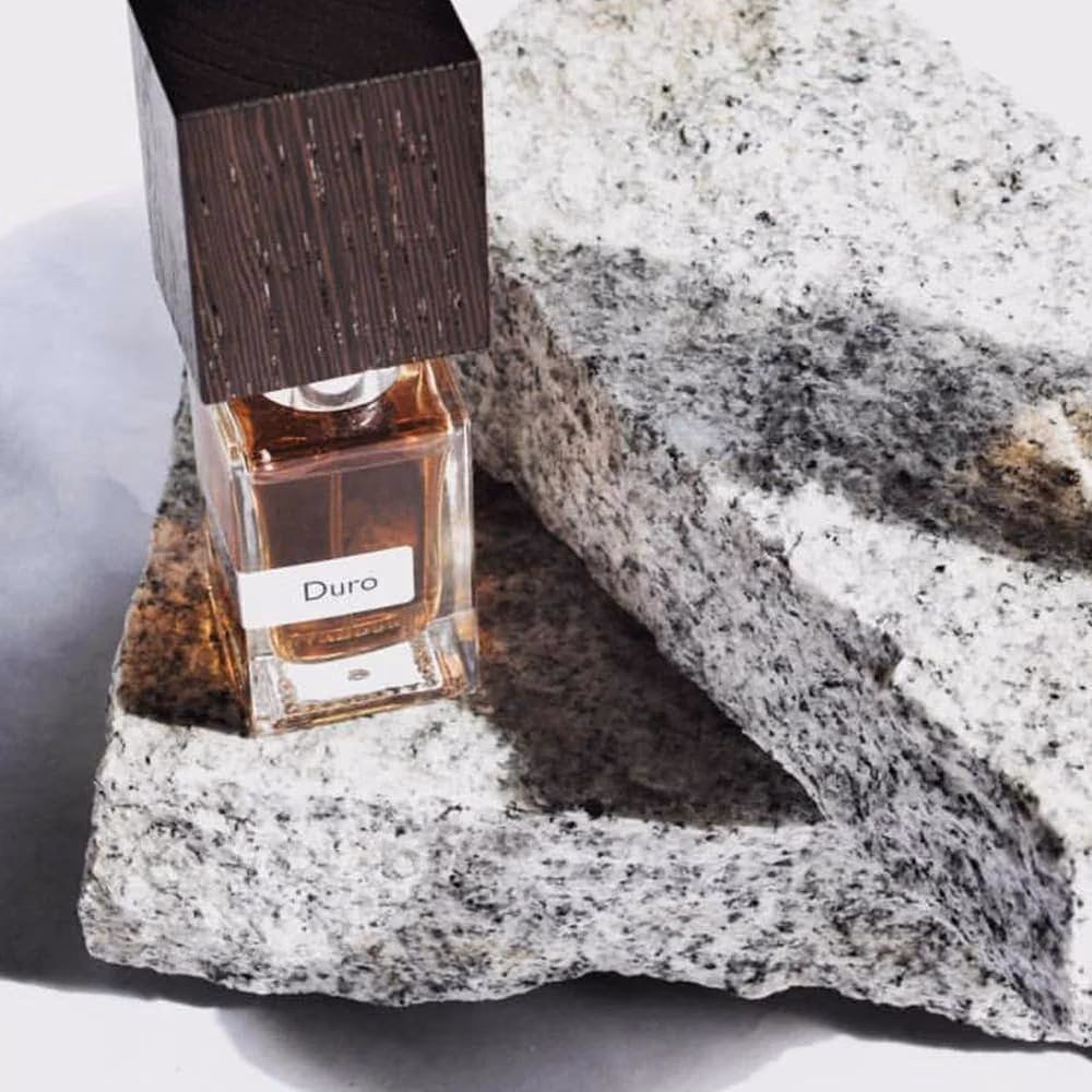 Faceted glass against deep shadow