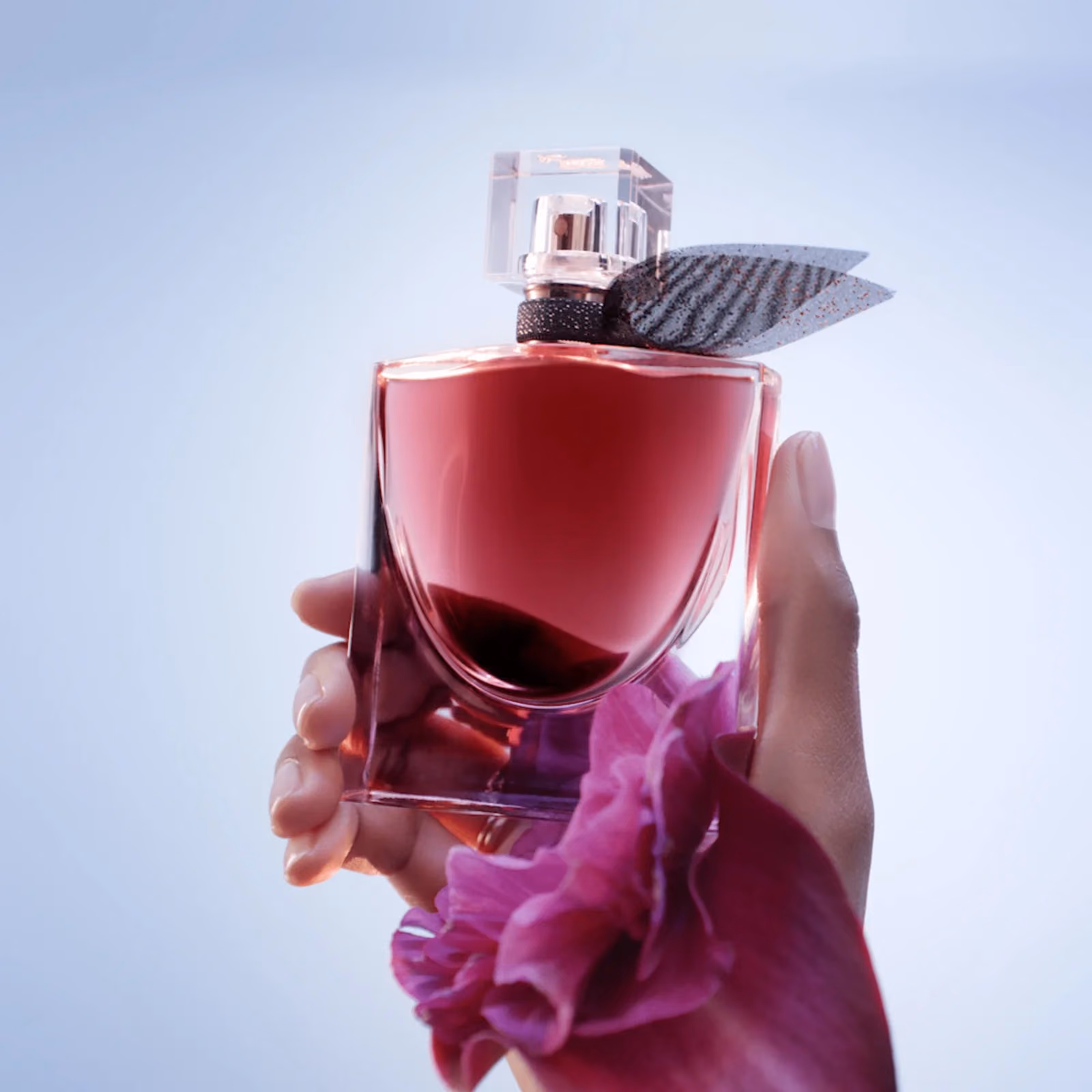 A tall bottle catching a hard highlight