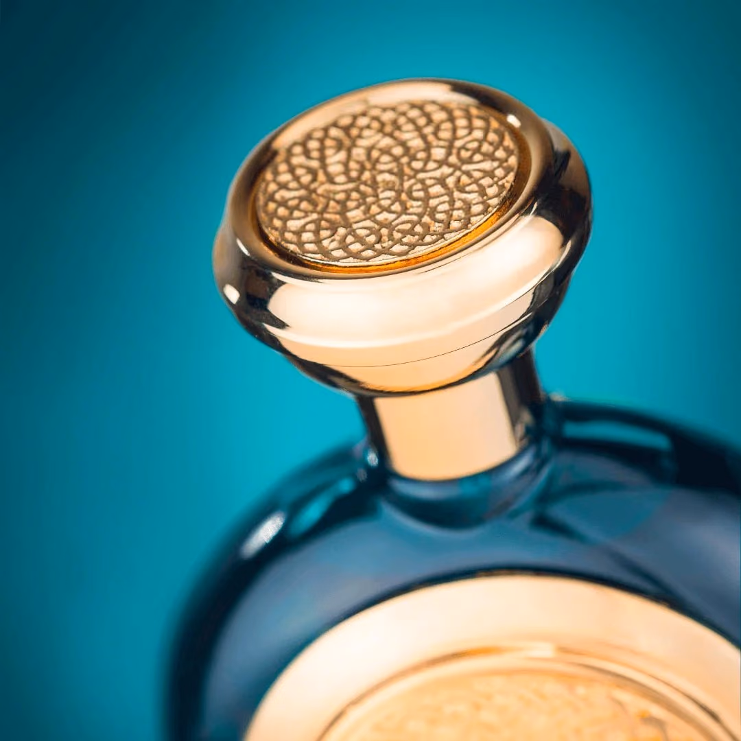 A perfume bottle in warm studio light